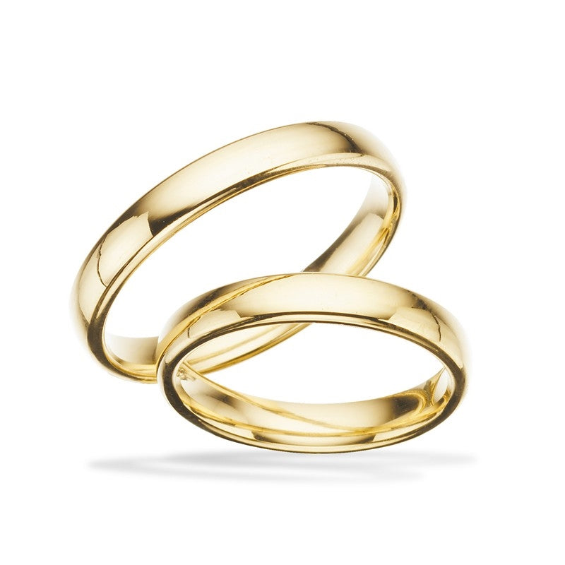 Tidløse Scrouples vielsesringe i 8 eller 14 karat guld med blank overflade og 3,5 mm bredde.